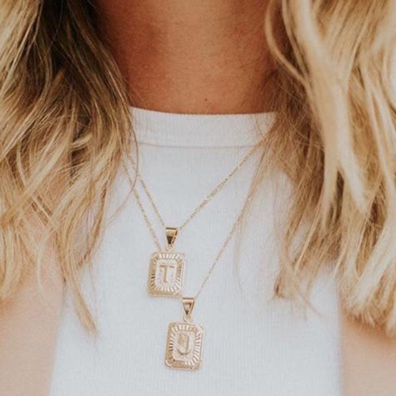 19 Initial Necklaces You'll Want to Wear Forever - Fashionista